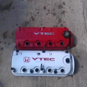 Got 2 valve covers. The red one is one I have under the hood now.