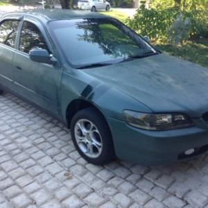 car completely painted Satin Green, looks mad max as F***!