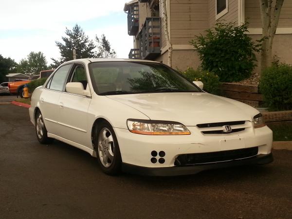 1999 Accord EX, lowered with stock look. Nothing to flashy, not my style. Wheels will be back on spring 2014