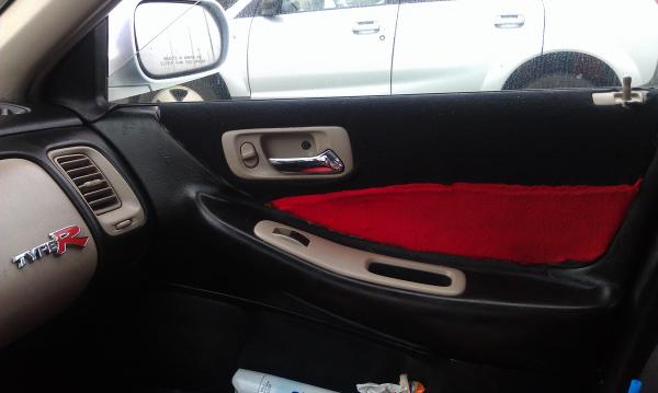 Plasti dip and a little liquid courage and you get this interior. I did wrap the inserts my self by sewing the pieces together. knowing how to so does