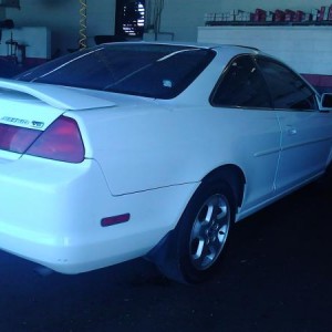 at the shop before i got her...even though the guy was cool we still had to check out...for 14 years old this had to be one of the best running cars e