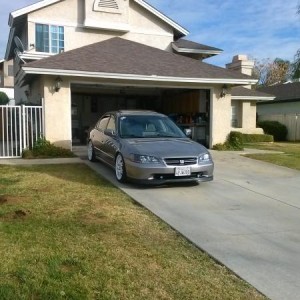 finally just installed the front lip ..gonna be lowered even more in a couple days ! :D