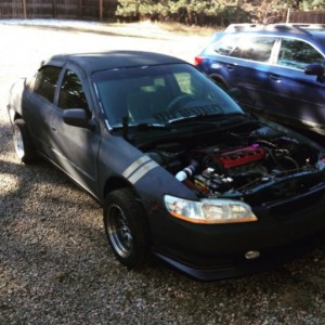 finally getting the front end back on. so cold in colorado.