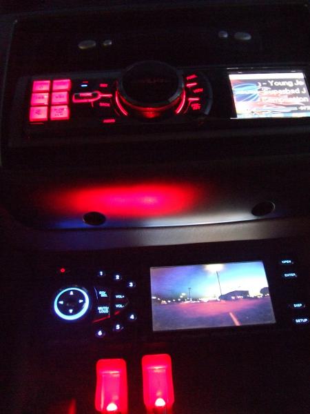 Alpine IDA-X001 HU
Custom mounted DVD Deck w/ hidden back-up cam
Toggle Switches r for Streetglow(i know, i know...but hey its a show car)