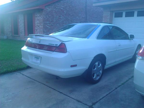 back window was shattered when i got her thats wassup with the blue tape...he fixed it for me, replaced the back struts(which i shouldve had him repla