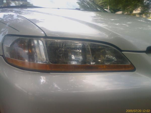 headlight (after restoration)::

sanding paper of 3 different grits...47 minutes of aggravation...one happy look