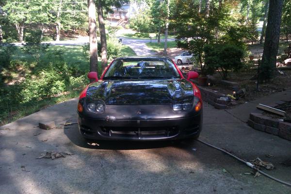 My 92 3000gt twin turbo with 94 front end conversion before I painted it. I loved this car so much but i blew a headgasket and warped the heads so had